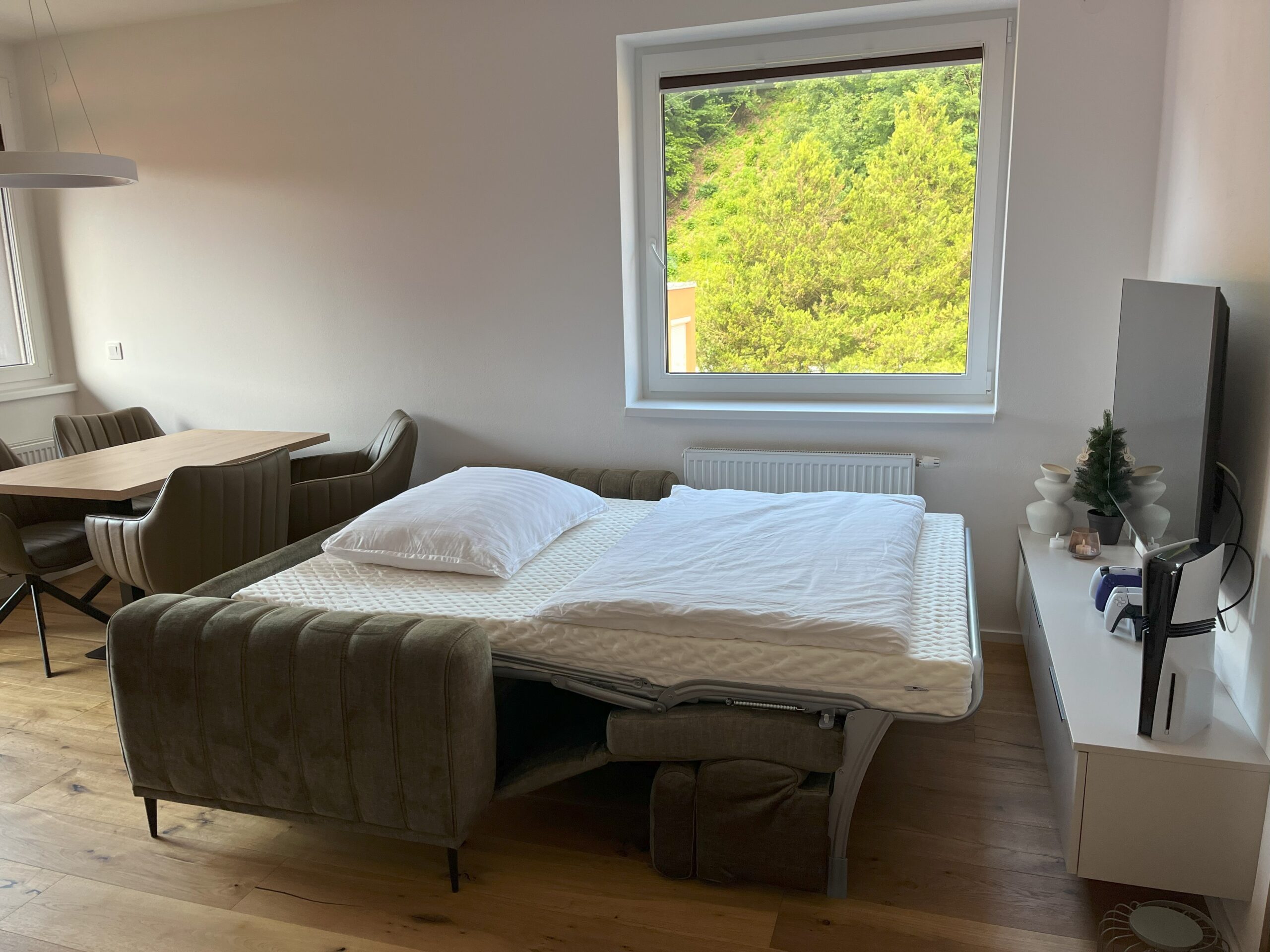 Rozkládací sofa na spaní